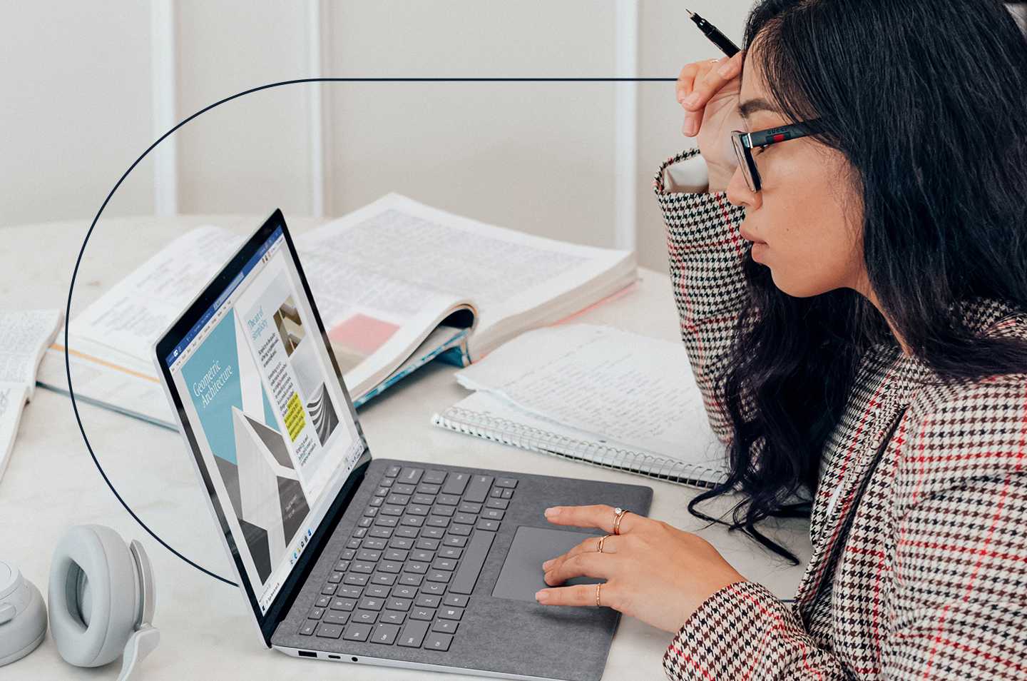 woman sitting in front of a laptop