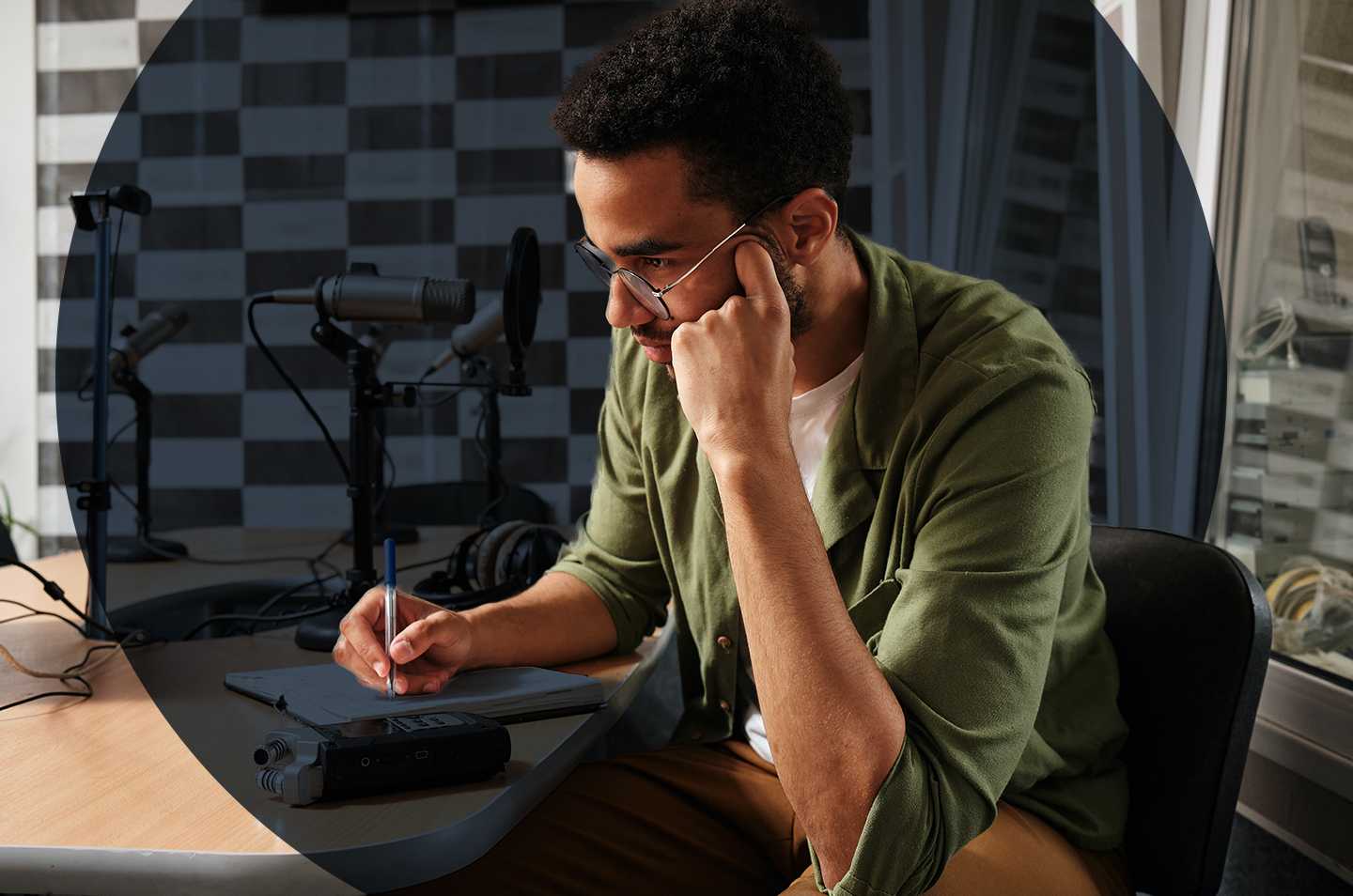 man sitting at a desk working