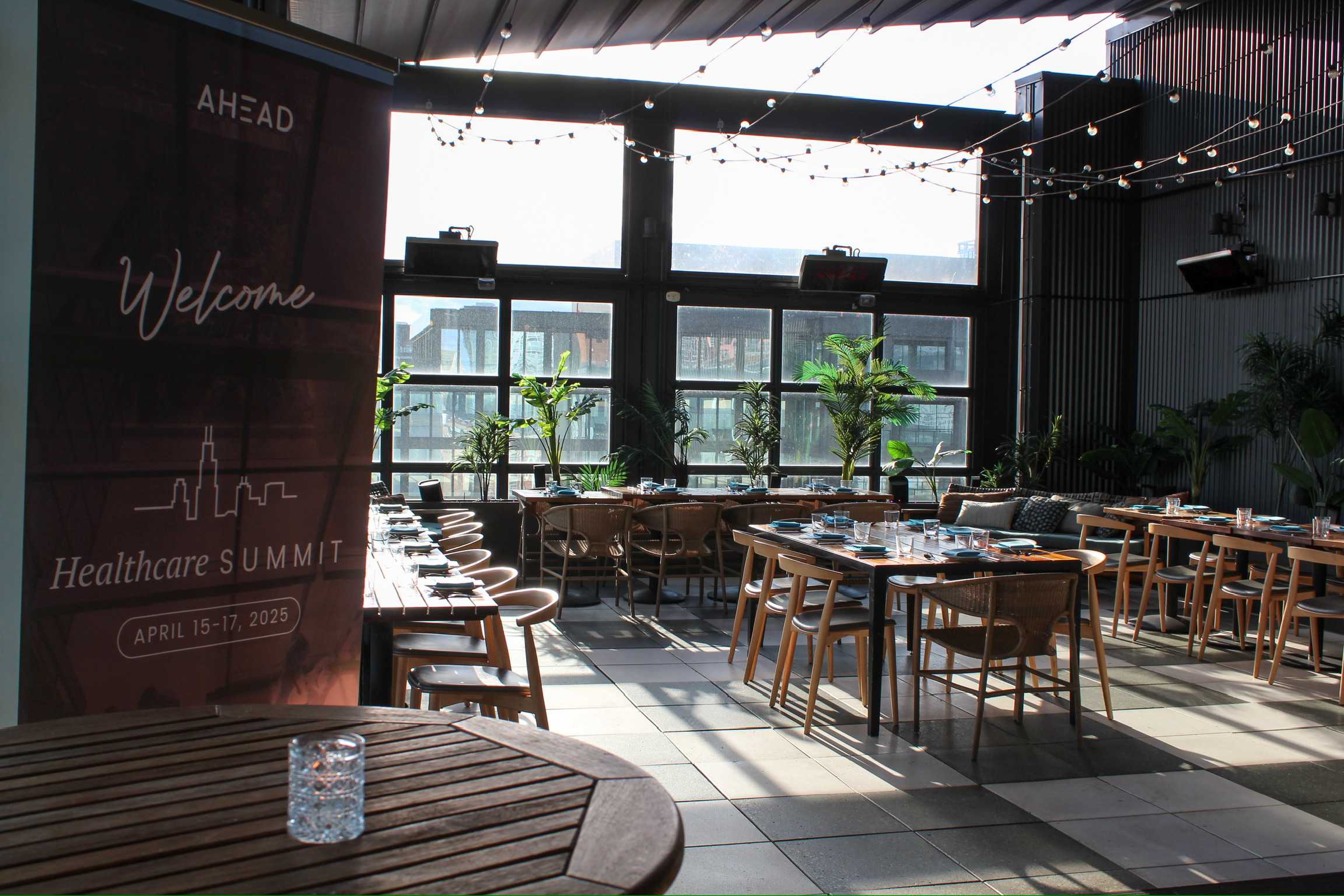 a picture of an empty restaurant with an event banner on the left